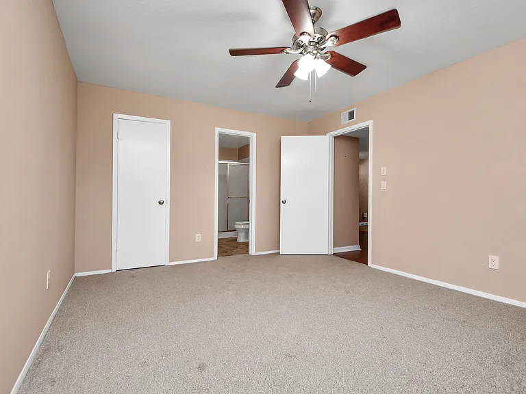 Primary bedroom with attached bathroom.