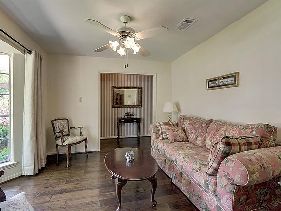 The formal living has Engineered Wood Floors that were just installed in March 2018.
