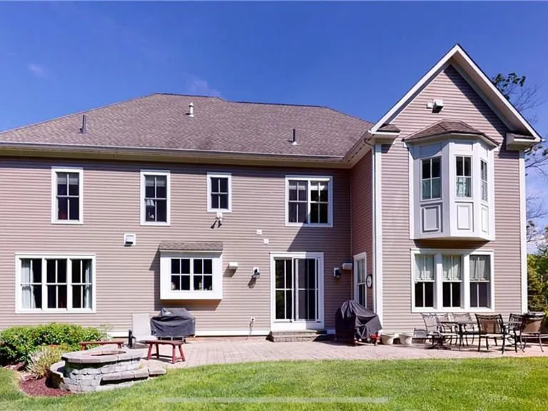 Backyard with huge patio.