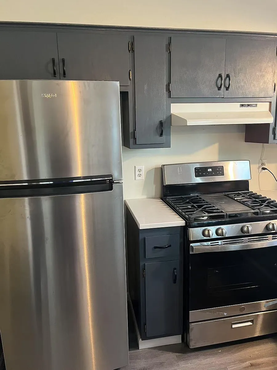 A side of Kitchen with new appliances - 14535 W Janice Pl