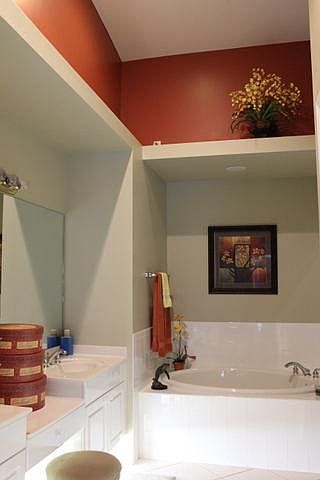 Master bathroom with large tub and walk in shower.