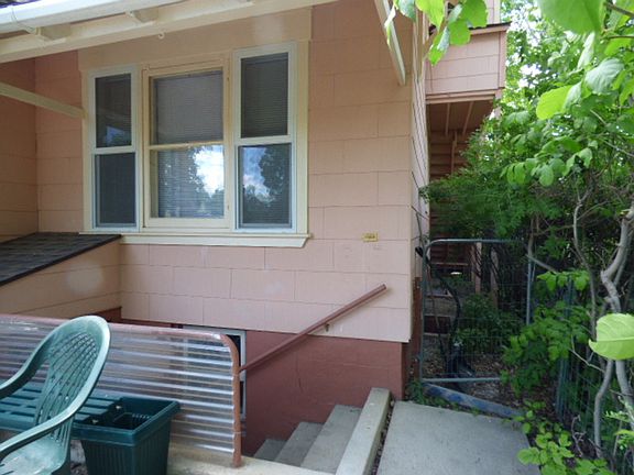 This front entrance is for the main level and there is a separate lower entrance for the 2 downstairs apartments