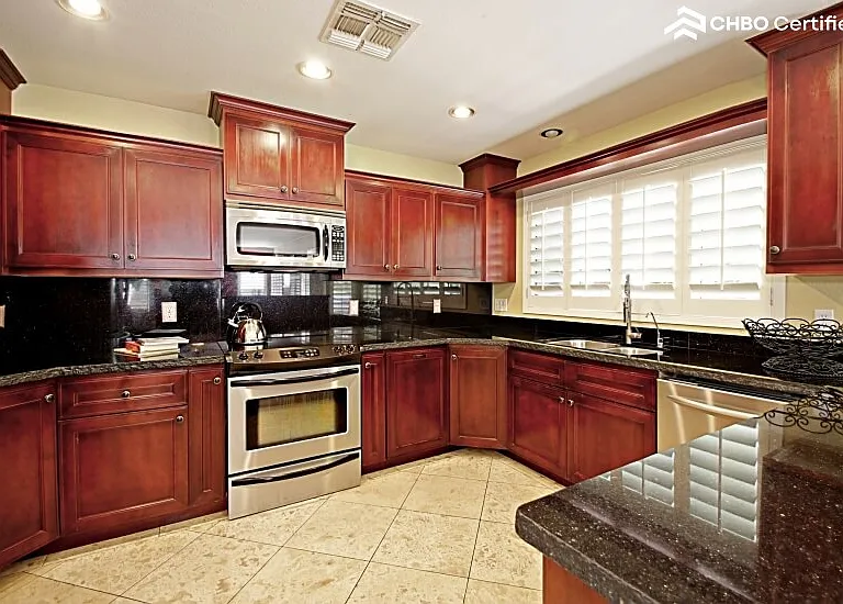 Cherry Wood Cabinetry and Stainless Steel App