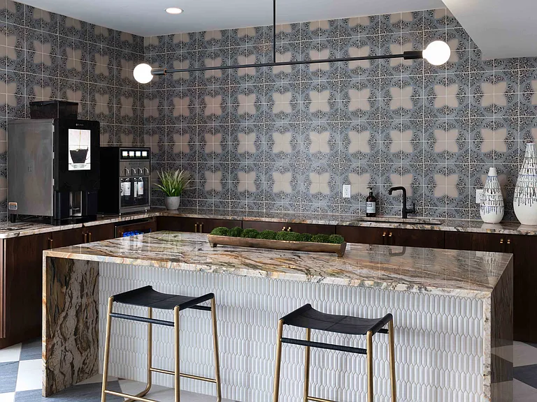 Resident lounge with gourmet coffee bar and wine station