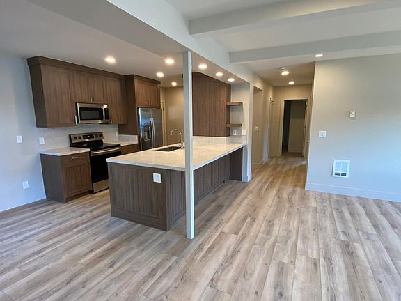 Kitchen central to living and sleeping areas