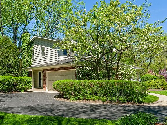 Side-load 2 car garage with turn around apron.