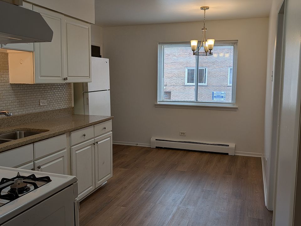 Kitchen with NEW granite countertop, floor, lighting, and sink