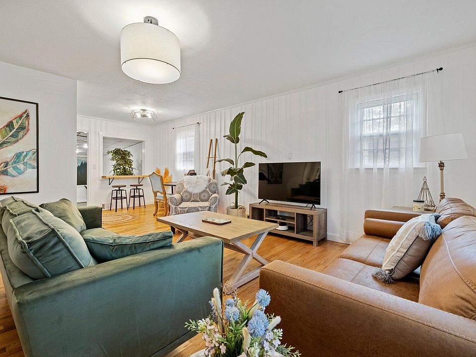 Welcome home! Open & airy living room.