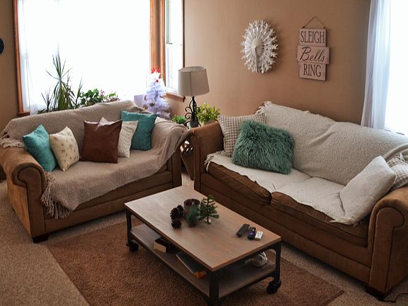 Living room with plenty of natural light. Great for entertaining.