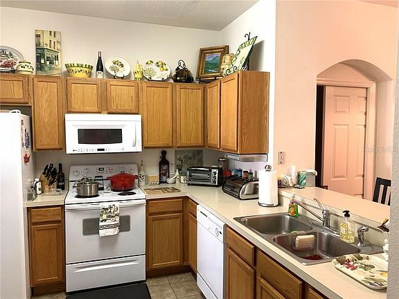 4th image of 9809 Blue Palm Way