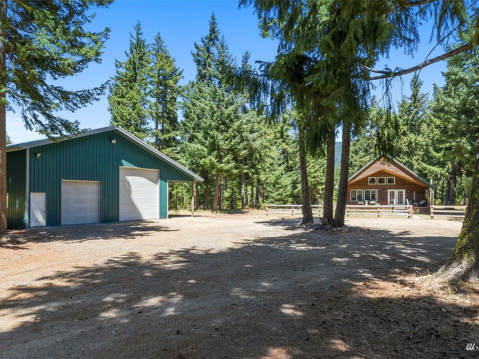 Welcome to 5711 Nelson Siding Rd.  Cabin & 2400 Sq. Ft. Shop!