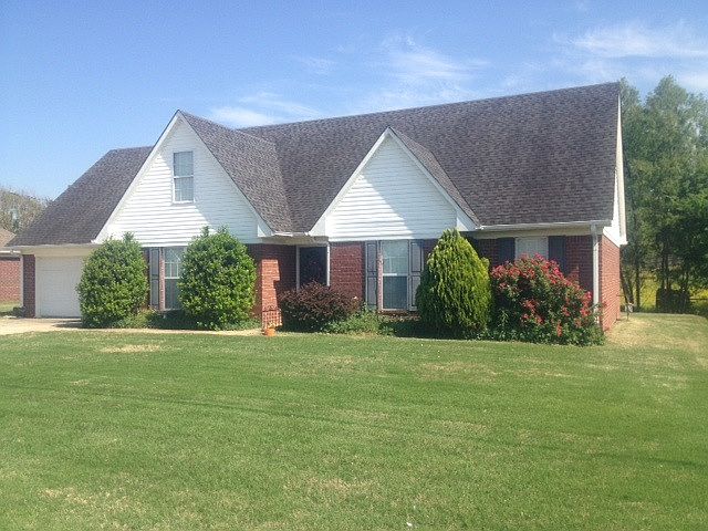 Front view, brick and siding