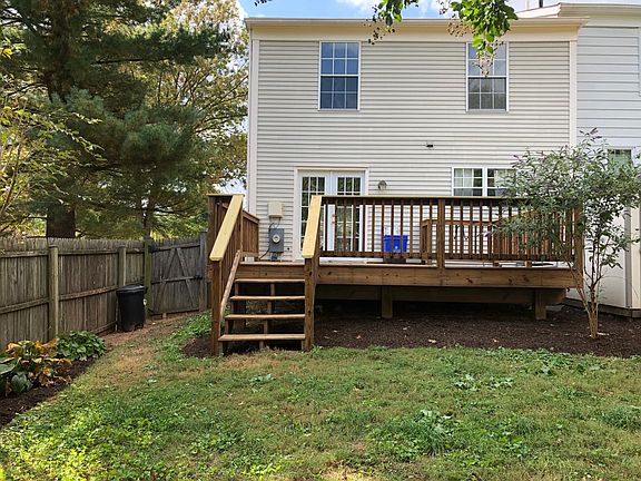 Fenced yard with deck