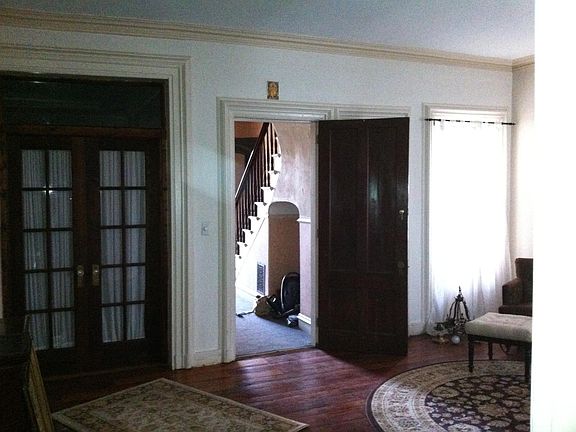 front entrance door from common entry hallway into the living room