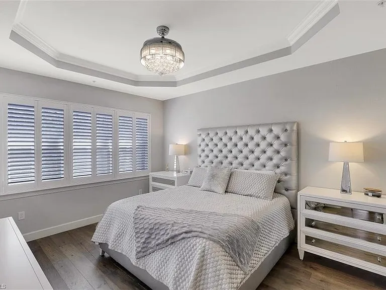 King master bedroom has tempur-pedic mattress, 2 large nightstands, tv. and a dresser. His and her closet