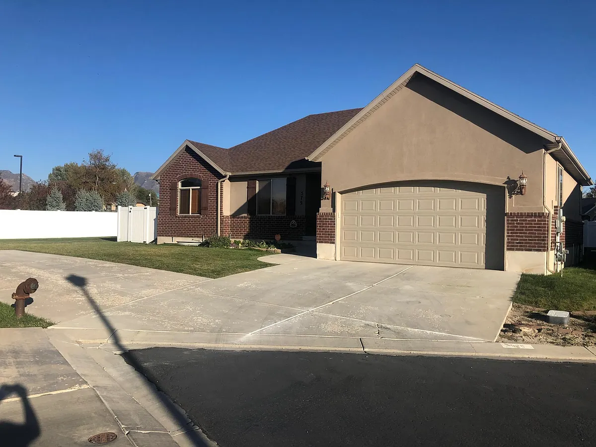 Exterior. 2 car garage with off-street parking. - 579 W 1275 N