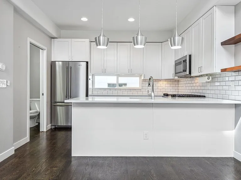 1551 W 43rd Ave — Photo 1