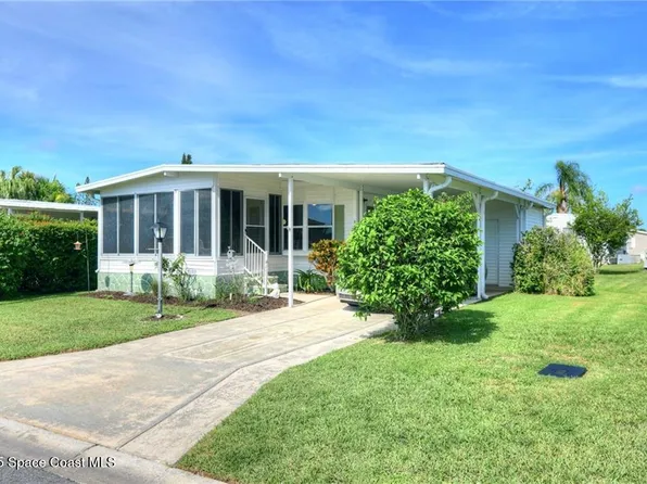 912 Oriole Cir, Barefoot Bay, FL 32976