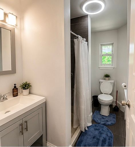 Renovated main bathroom with pantry