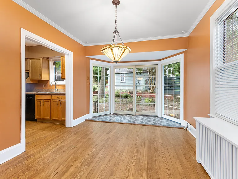 Beautiful bay window alcove that floods the dining area with natural morning light.