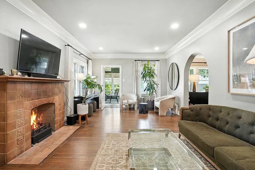 Living room looking toward sunroom - 202 E Hazel Blvd S