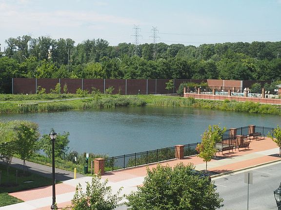 Pond across the street, with community pool adjacent.