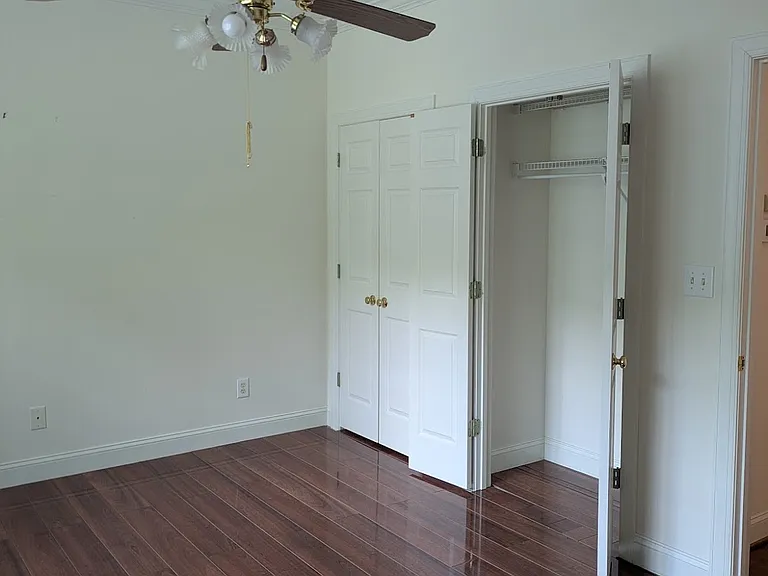 1st Bedroom view with double closets.