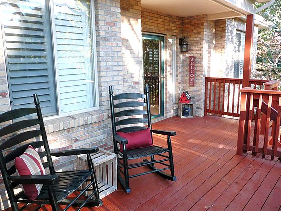 Charming Front Porch Invites you to 'Set a Spell'