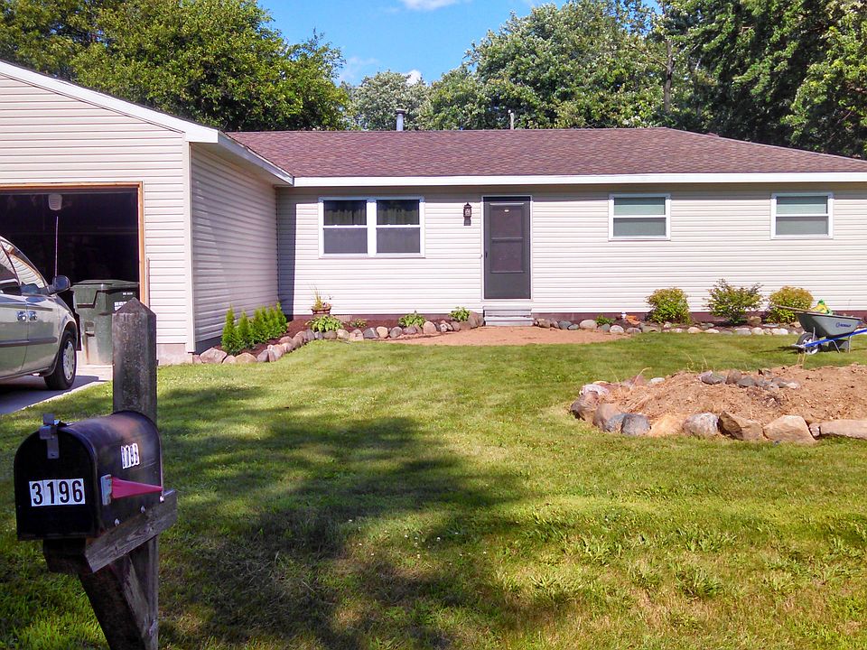 Added garage & siding