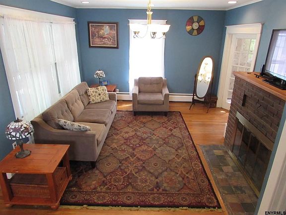 Spacious Living Room with Hardwood Floors...