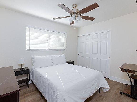 Light and bright with a large window, plus a ceiling fan to cool off when needed