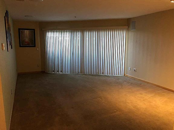 Living Room with vertical blinds, great privacy