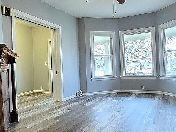 living room and view into front entry/foyer