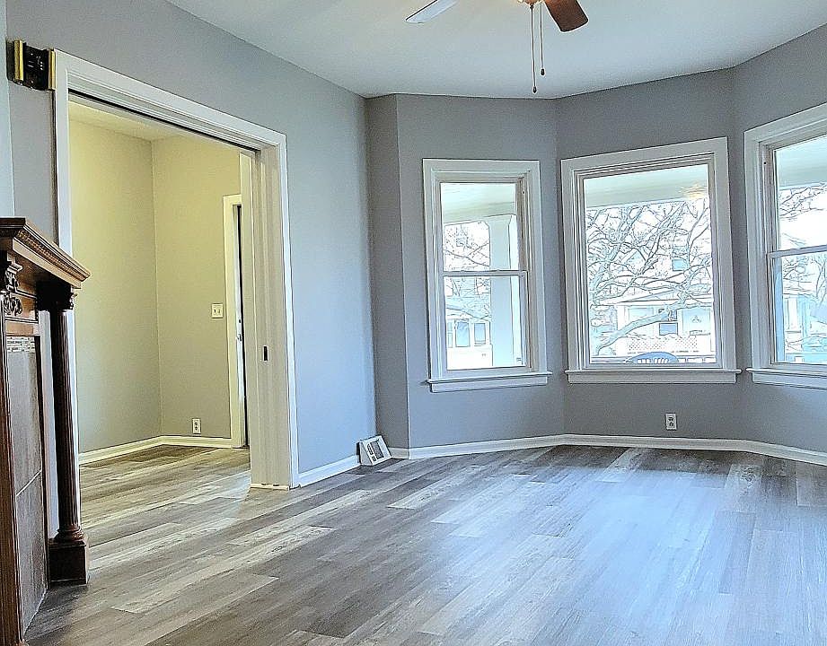 living room and view into front entry/foyer