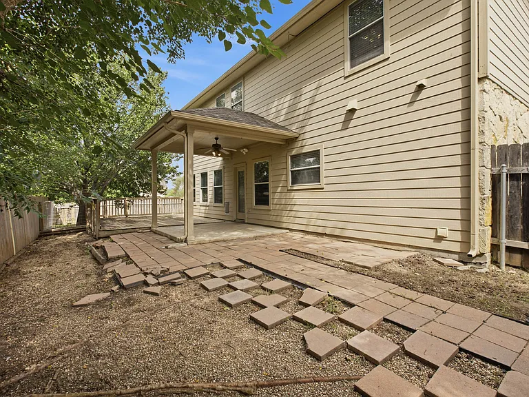 Large wooden deck, covered patio and large grassy section