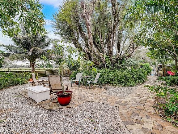 Sit around the outdoor firepit