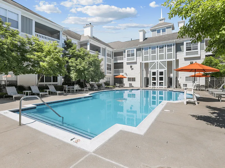 Resort-style pool with sun deck at The Crossings at Russett in Laurel, MD
