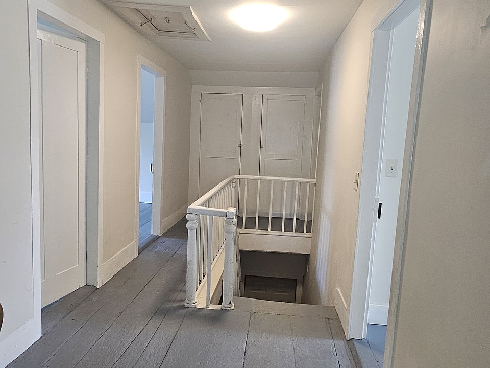 Center hallway with two closets at rear