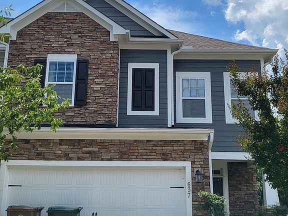 Front view with private driveway