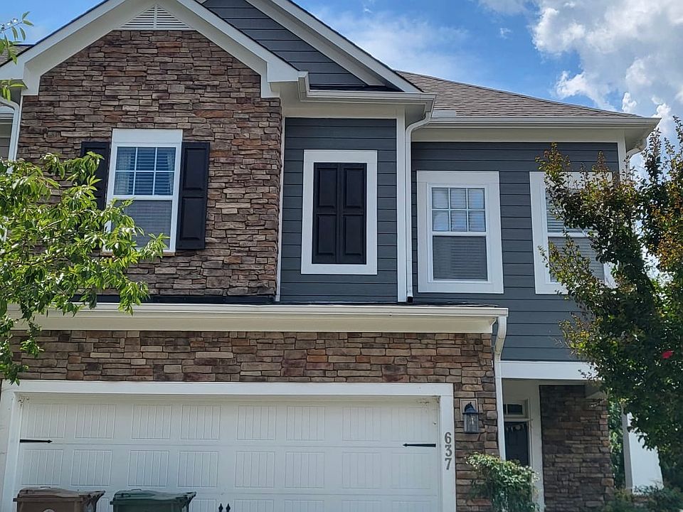 Front view with private driveway