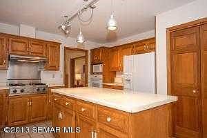 Large kitchen with tile floors