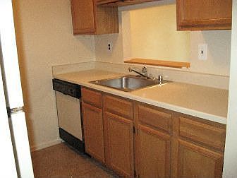 Galley Kitchen with Pass Through to Dining Area