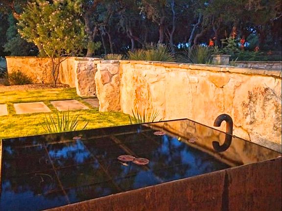 raised corten fish pond