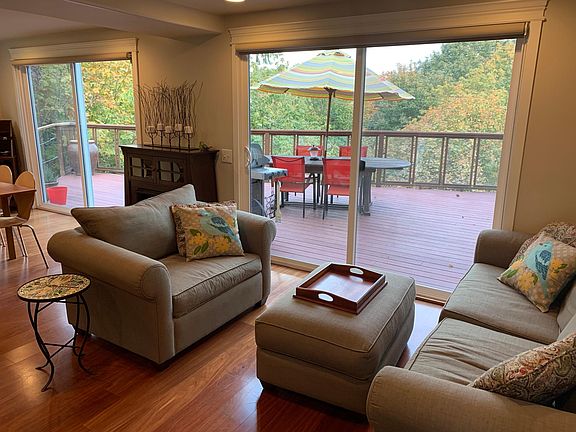 Cozy sitting area with sliding glass doors and views