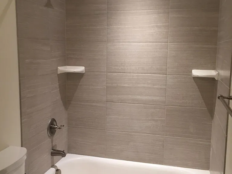 Nice clean bathroom with newer shower fixtures.