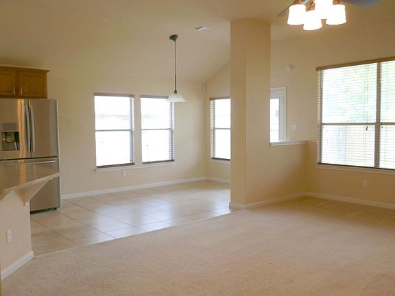 Spacious Living and Dining Areas with plenty of natural light