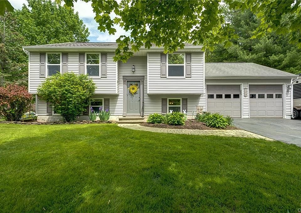 Welcome to this meticulously cared for Raised Ranch located in North Syracuse