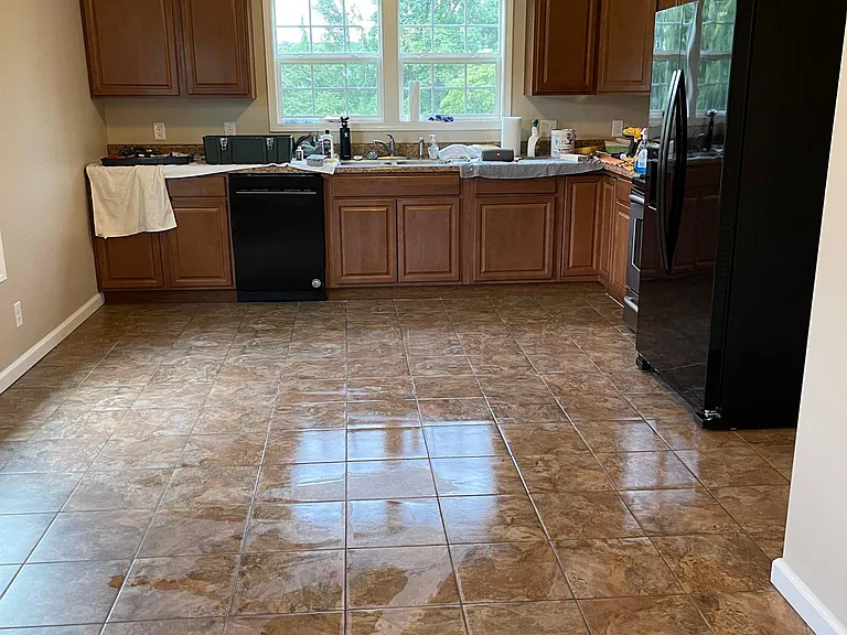 Kitchen.. includes refrigerator with ice maker and water and ice dispenser in the door, stove, dishwasher and microwave