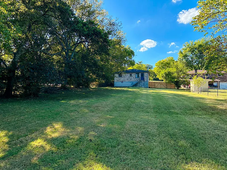 Fully fenced backyard on 1/2 acre
