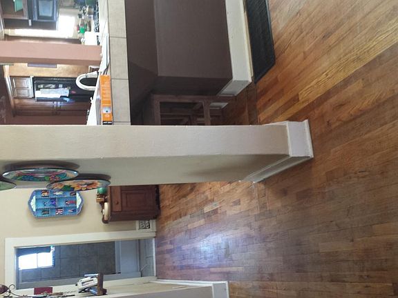 hallway/eat in custom kitchen